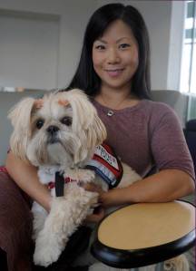Staff Sgt. Sandra Lee, with U.S.  Army Reserves, prior to the Joe&rsquo;s Heroes&rdquo; award ceremony honoring Lee who was injured by improvised explosive device in Iraq,  with her is her service dog named Emma who helps her cope with post traumatic stress disorder,  Monday, Oct. 15, 2012, at Manchester Community College in Manchester. (Jim Michaud/Journal Inquirer)