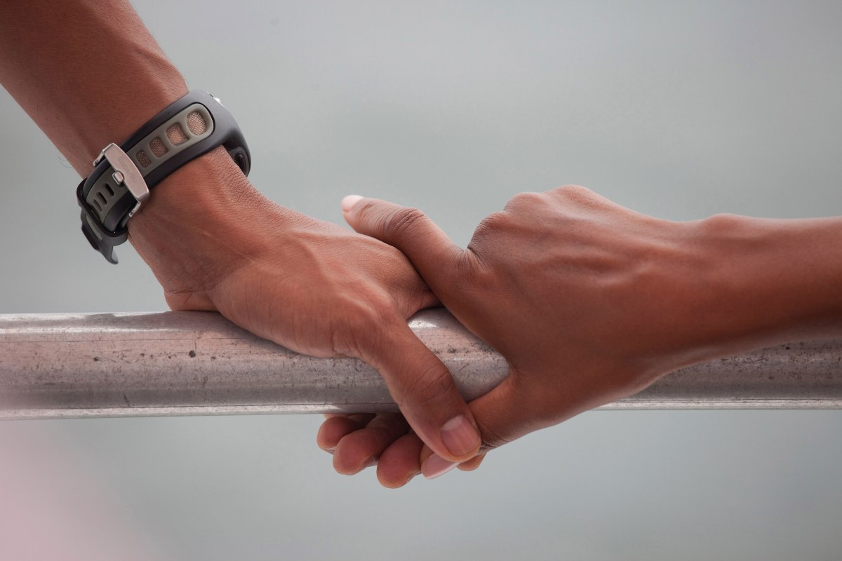 Barack Obama and Michelle ObamaÃ¢ÂÂs hands rest on the railing of a boat during their tour of St. Andrews Bay in Panama City Beach, Fla., Aug. 15, 2010.