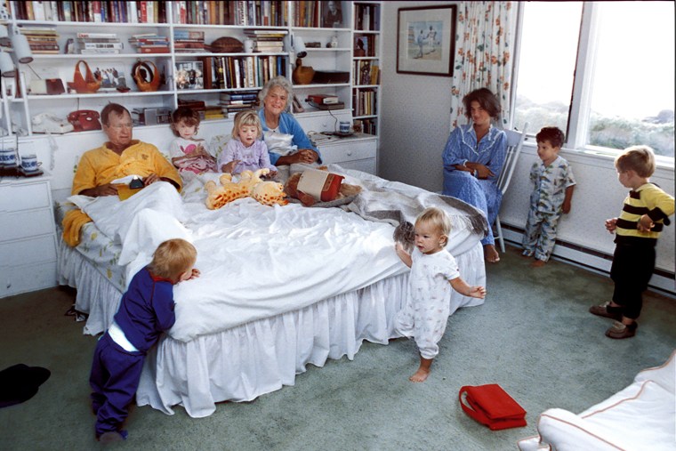 George and Barbara Bush in bed with some of their grandchildren including, Jenna and Barbara Bush, Pierce Bush, Marshal Bush, Jeb Bush Jr, Sam LeBlond and daughter in-law Margaret Bush at their home in Kennebunkport, Maine Aug 1987.