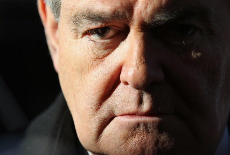 Newt Gingrich listens to questions from the media as he arrives at an education town hall, on Jan. 4, 2012 in Concord, New Hampshire.