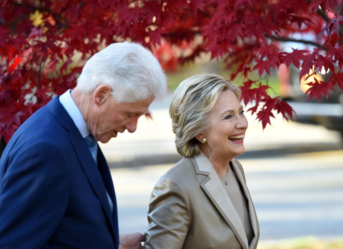 Hillary Clinton and her husband Bill Clinton leave after casting their ballots at a polling station, on Nov. 8, 2016, in Chappaqua, New York.