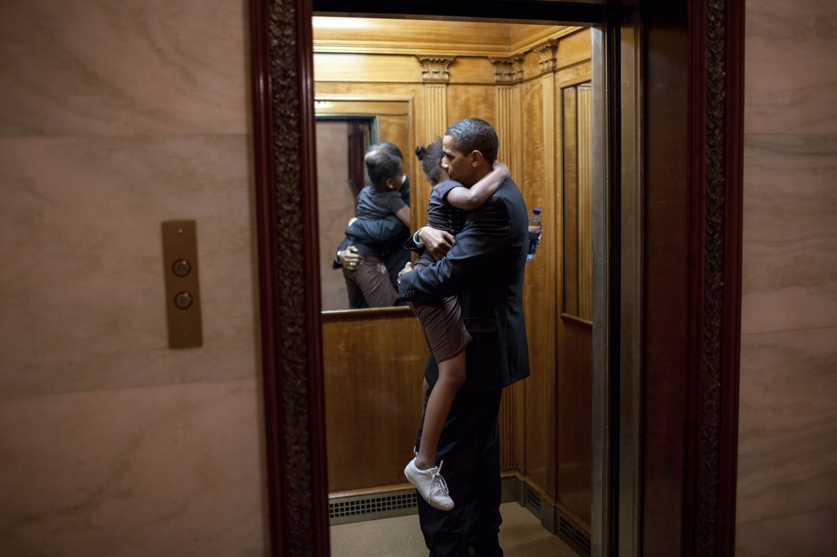 In this official White House photograph, President Barack Obama holds SashaÃÂ after finding her in an elevator after an eventÃÂready to head upstairs to the private residence. He decided to ride upstairs with her before returning to the Oval Office, May 19, 2009.