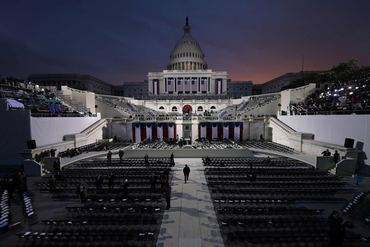 The sun begins to rise behind the Capitol dome several hours before Donald Trump takes the oath of office as the 45th President on Jan. 20, 2017.