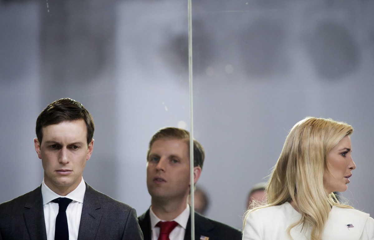 Jared Kushner, senior advisor and son-in-law to President Donald Trump, Eric Trump and Ivanka Trump watch the Inaugural Parade in Washington, D.C., on Jan. 20, 2017.