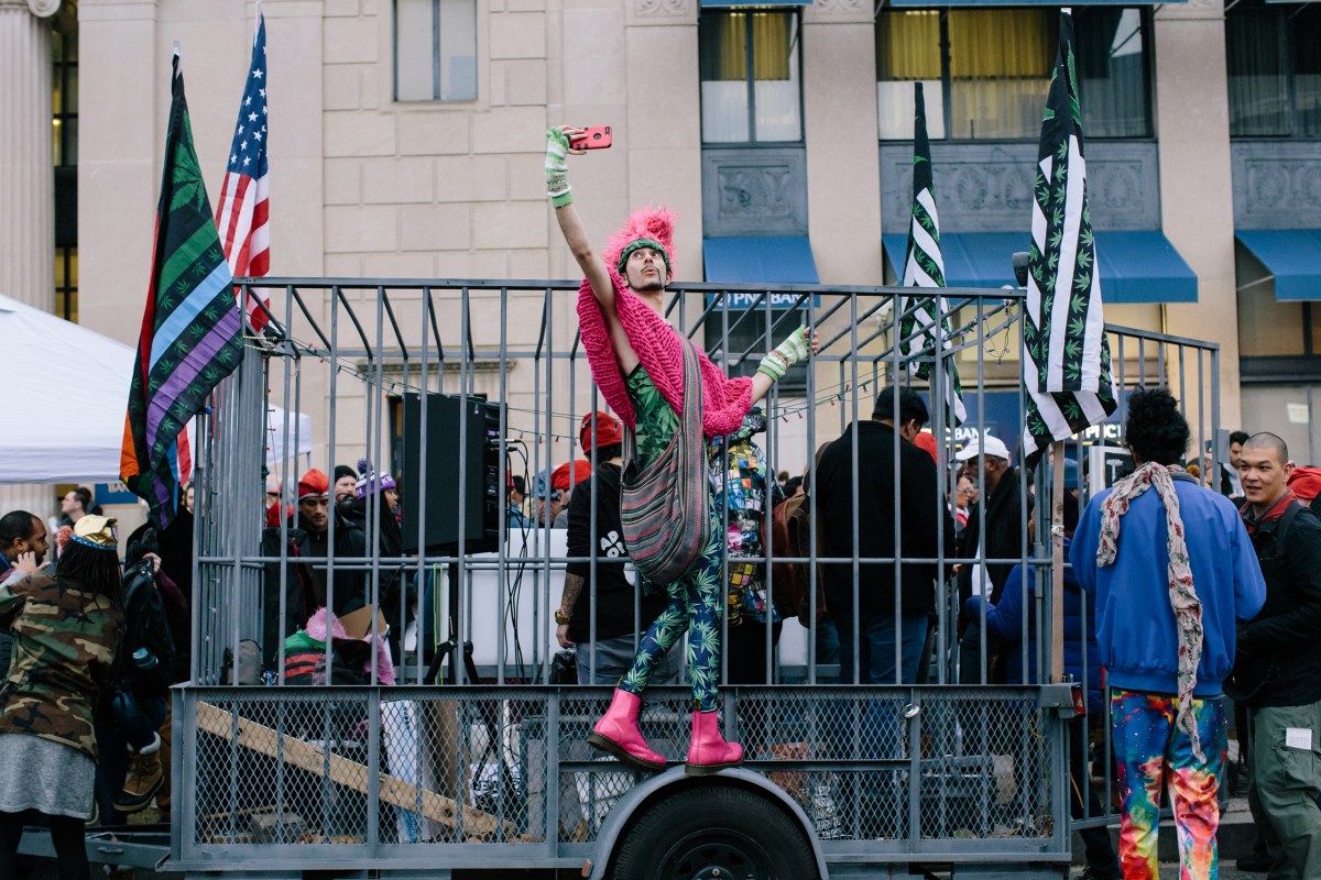 Seth Kaye, 26, a DCMJ volunteer dressed up for the #Trump420 event, takes a selfie. An estimated 10,000 people showed up to receive a free joint given away by DCMJ, a marijuana advocacy group, near Dupont Circle on Donald Trump's Inauguration Day on Jan. 20, 2017.