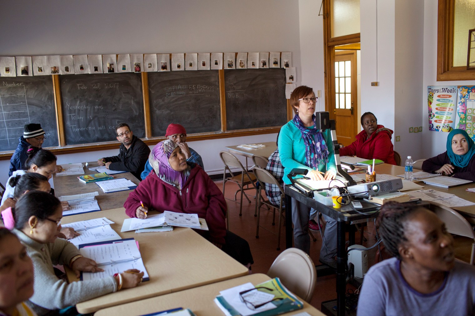 Abdul Fattah Tameem listens to instruction during ESL class at a community college in Des Moines, Iowa.