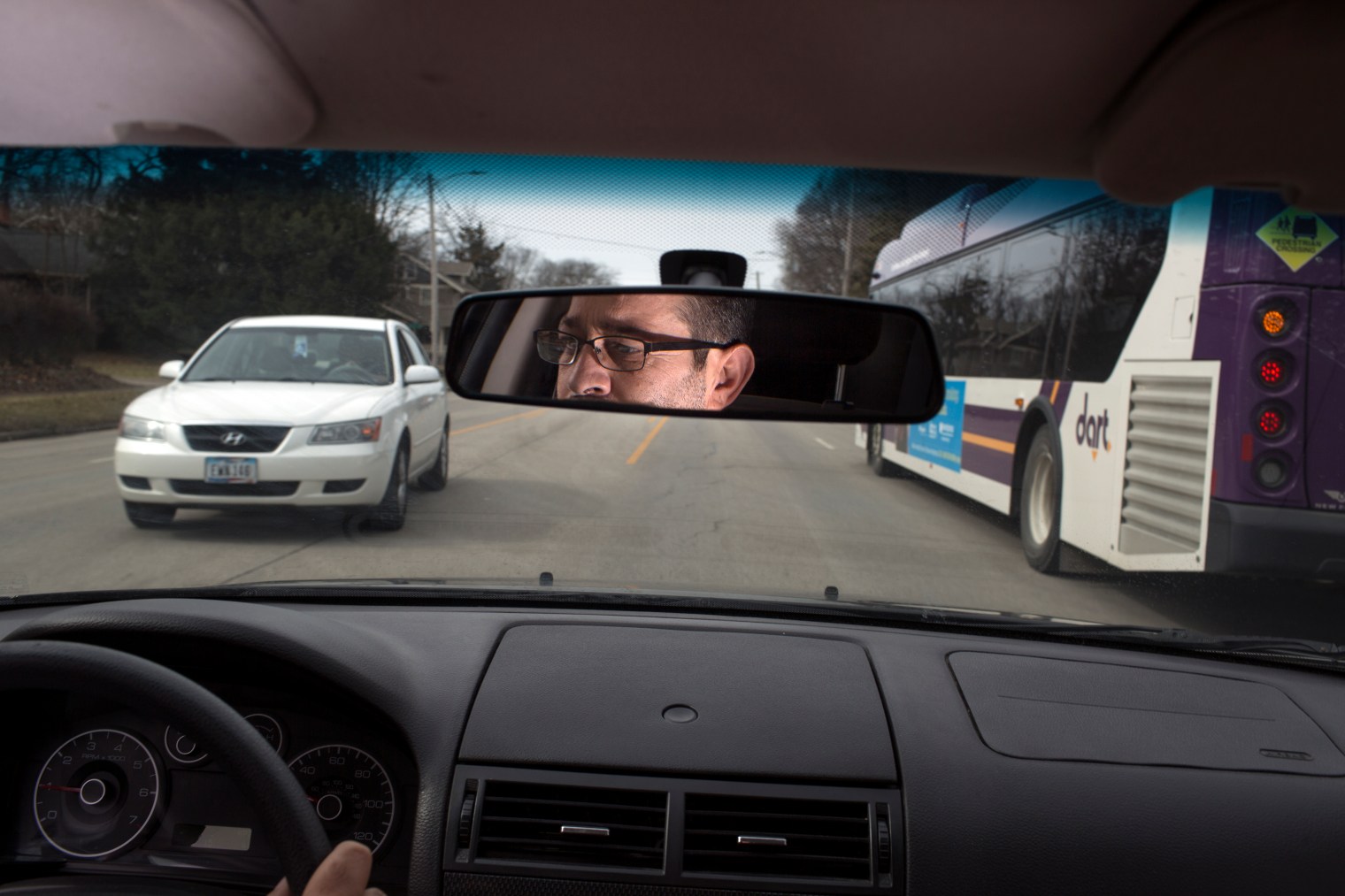 Abdul Fattah Tameem drives to the store in West Des Moines. Abdul Fattah and his wife, Ghazweh Aljabooli, moved their family to West Des Moines, a suburb of Des Moines, Iowa.