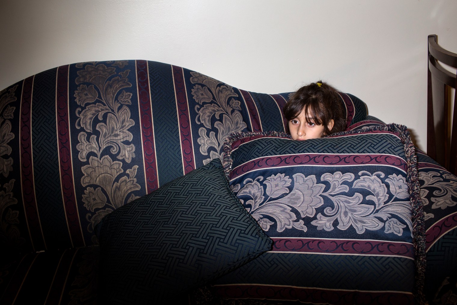 Ghazweh Aljabooli and her children wait for the last few minutes before breaking their fast during Ramadan at their apartment in West Des Moines, Iowa.