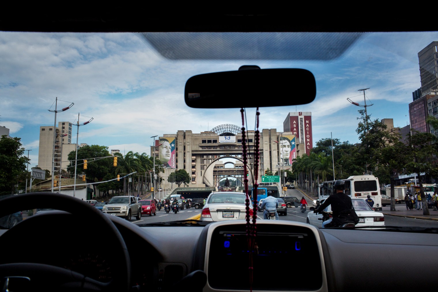 Juan Requesens, an opposition lawmaker and former student leader, rides toward the National Assembly building in downtown Caracas on Aug. 2, 2017.