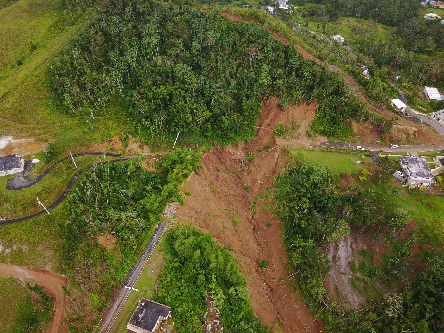 Road 143, pictured here in the town of Barranquitas, remains inoperative after a mudslide triggered by Hurricane Maria. The road is a primary thoroughfare in central Puerto Rico.