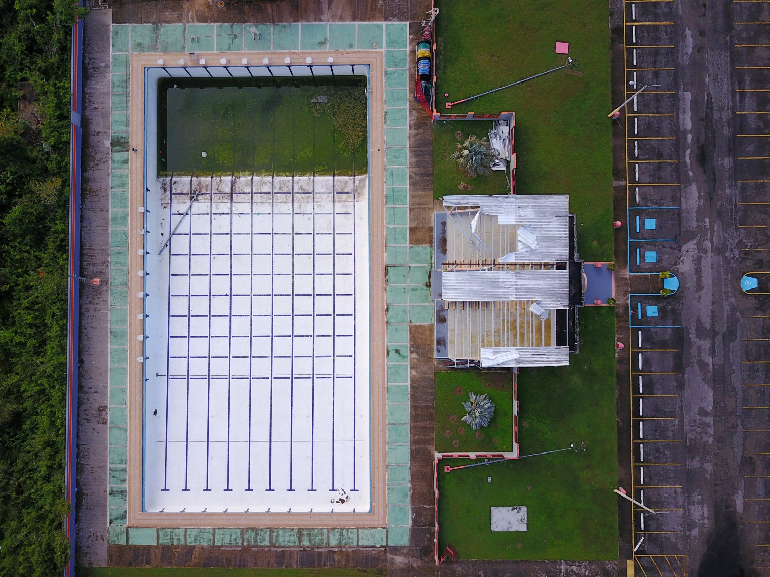 A pool is left in disrepair at a sports facility in Vega Baja
